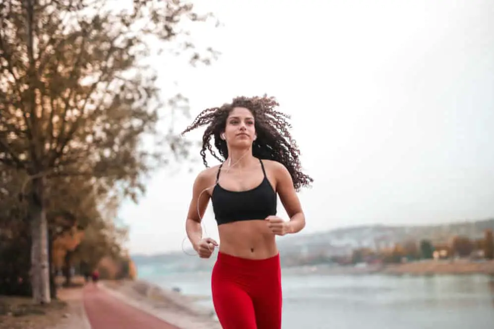 Running with red pants and black bra